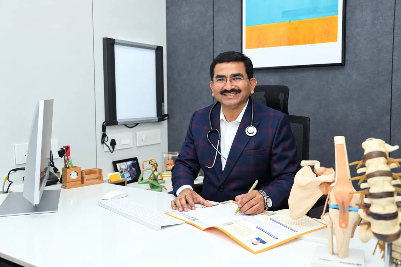 Dr. Arvind Shiroya in consultation at Shiroya Orthopedic Hospital
